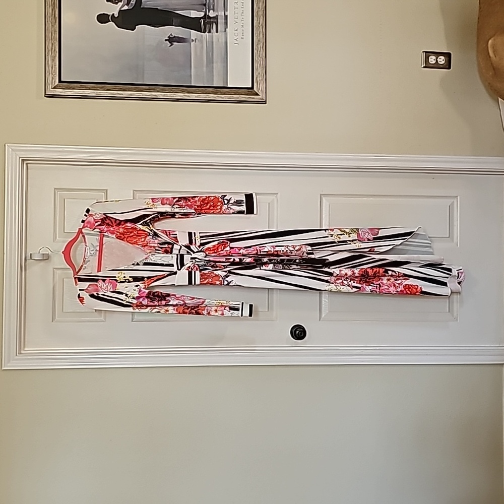 Venus multi colored high low blouse with front tie belt.